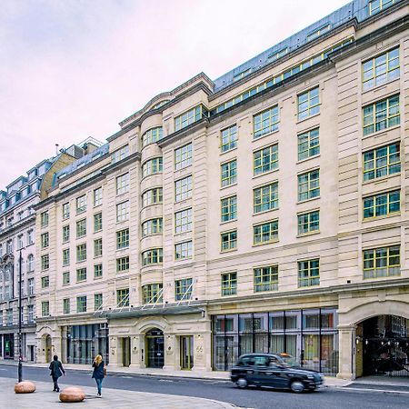 Middle Eight - Covent Garden - Preferred Hotels And Resorts London Kültér fotó The photo shows a large, multi-story building with a classical architectural style. The facade features a mix of light-colored stone and large windows, giving it a sophisticated appearance. The building has several levels with prominent horizontal li